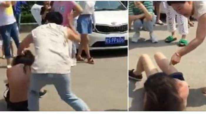 Gruaja rreh barbarisht të dashurën e burrit në rrugë(Video)